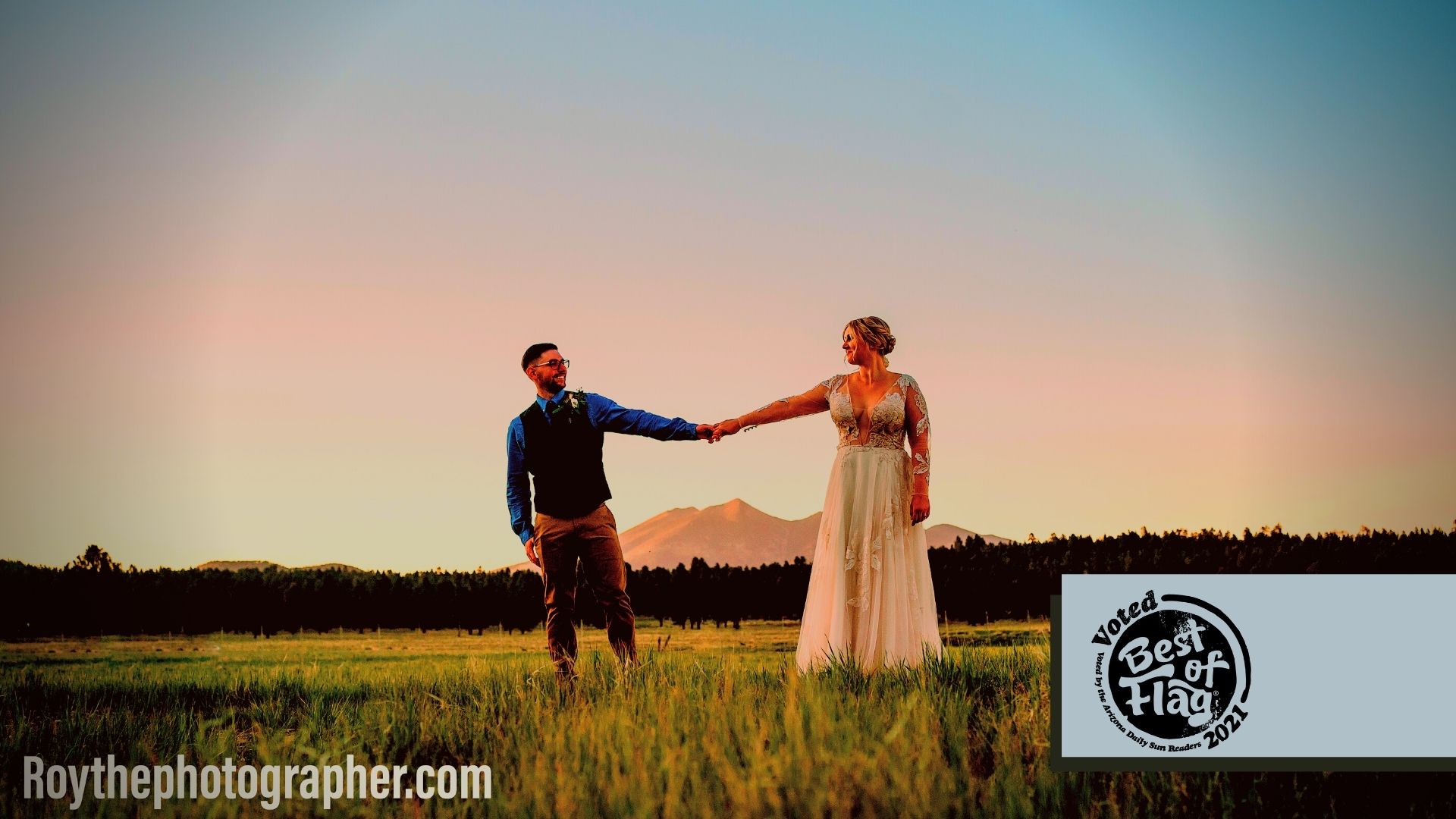 Bride and groom in front of peaks